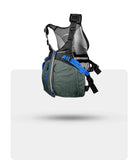 Stohlquist green and black kayaking life jacket with blue straps, mesh back, and front zipper.