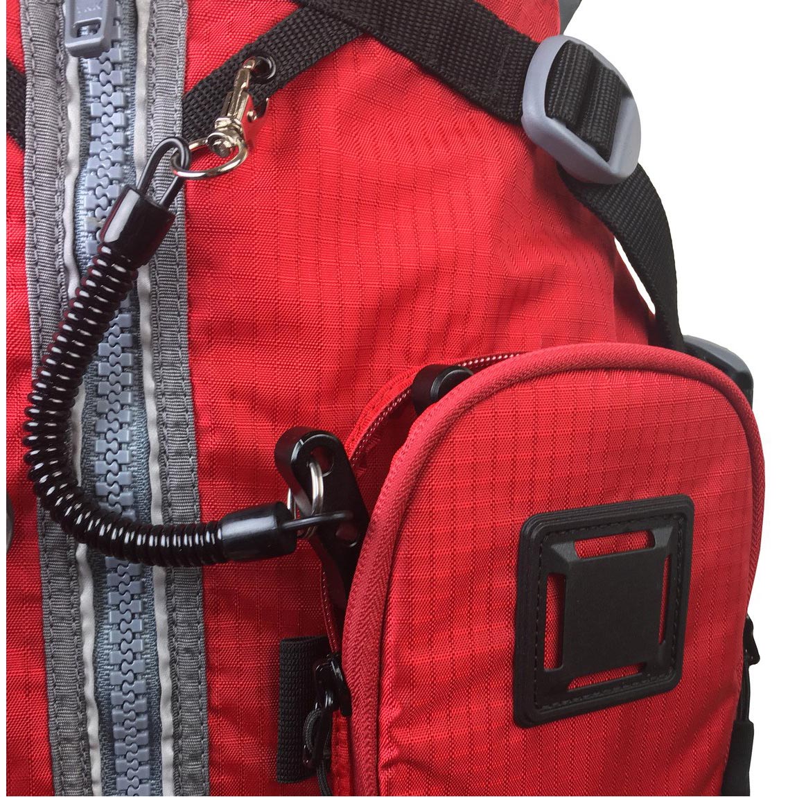 Closeup of red Stohlquist kayaking life jacket with zippered front and gear attachment clip